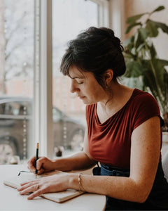 Leia working on designing a piece of jewelry at her studio in Missouri